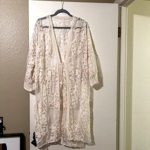 Lace swimsuit cover up, ties in the front, lace detail.